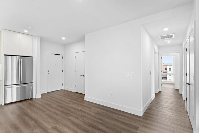 Building Photo - 2 Bedroom Corner-Unit with Wooded Balcony ...