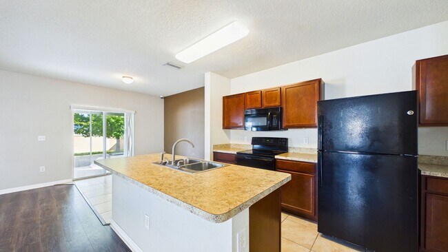 Building Photo - 4-Bedroom Home with Spacious Layout in Ayersworth Glen – Wimauma, FL