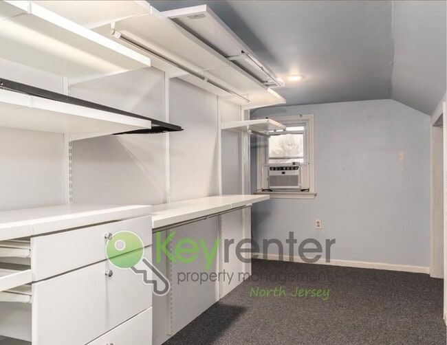 Building Photo - Spacious 3-Bed, 2-Bath Nutley Home with Bonus Office, Multi-Level Deck & Quiet Location