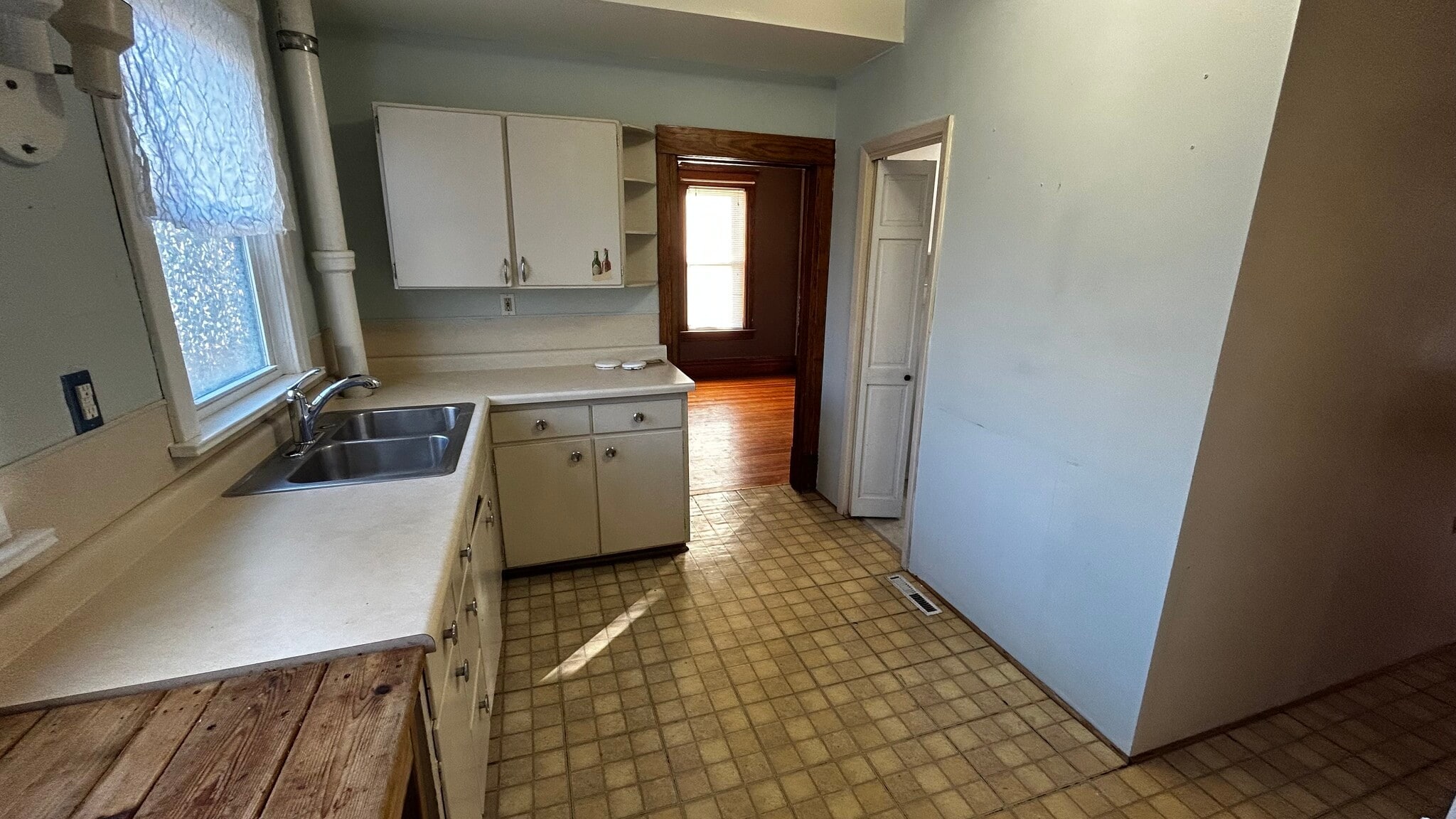 Kitchen (bedroom straight; bathroom right) - 509 E Maple St