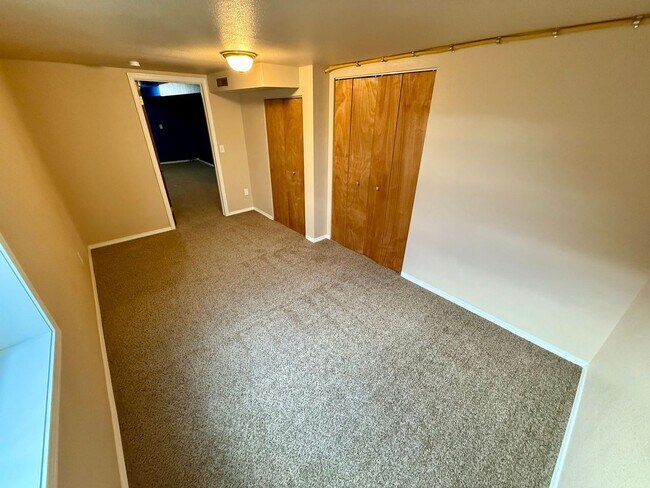 Building Photo - **For Rent: Spacious 4-Bedroom Home with 2...