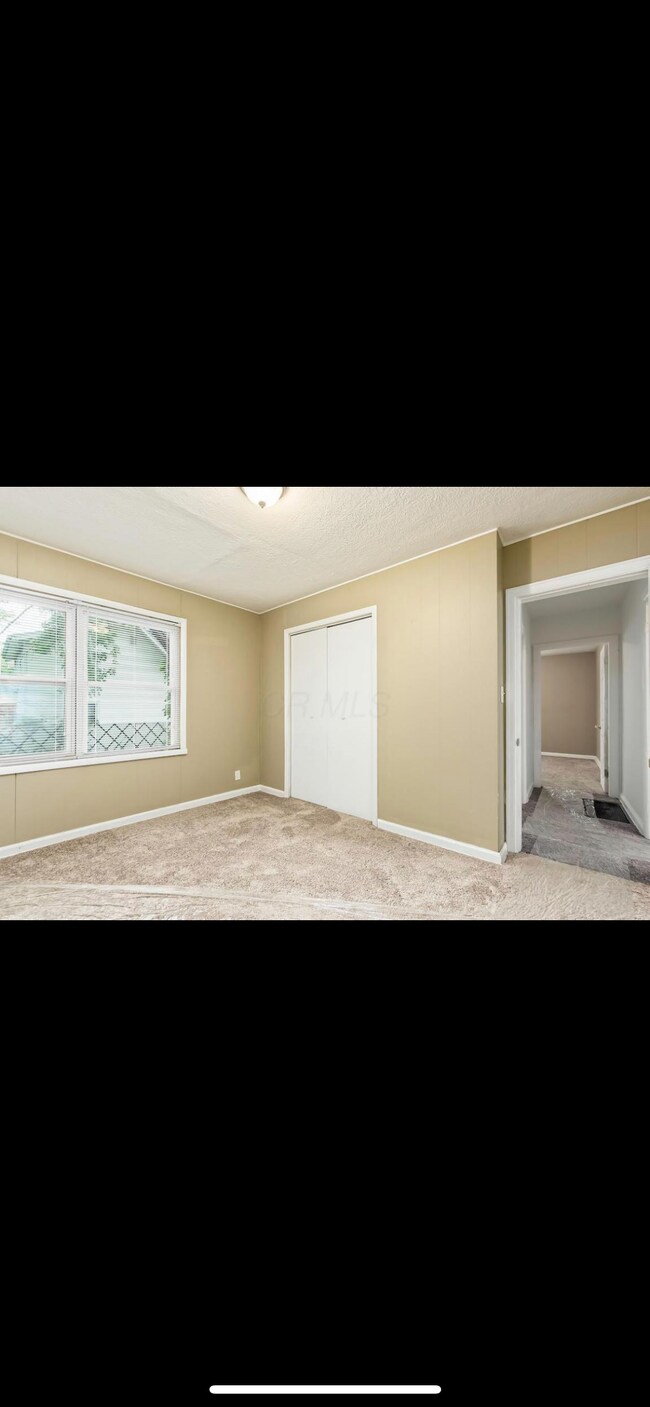 Building Photo - 1246 E 22nd Ave