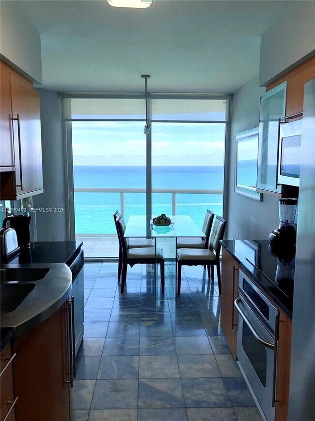 Building Photo - 6365 Collins Ave