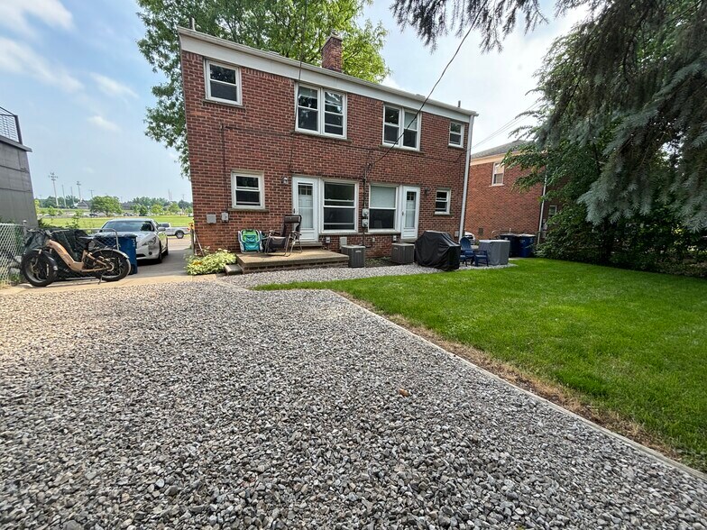 The back of the building and yard - 506 W Stadium Blvd