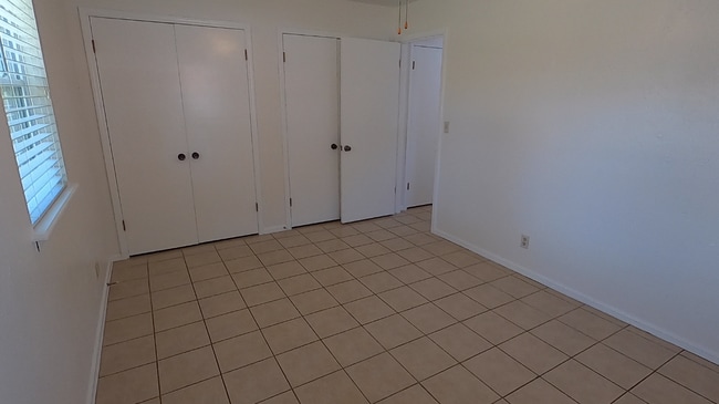 Primary bedroom view of double closets - 415 W Guthrie St