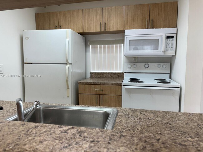 Building Photo - 8550 N Sherman Cir