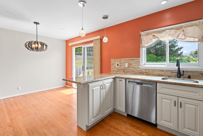 Building Photo - Coastal Charm in Linda Mar - Spacious Home...