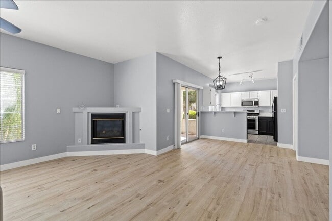 Building Photo - Sleek 2 Bedroom Condo with 2 Car Garage Ne...