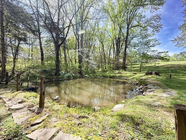 Building Photo - Private 5-Bedroom Dream Home with Creek, Pond & 3 Levels of Living Space