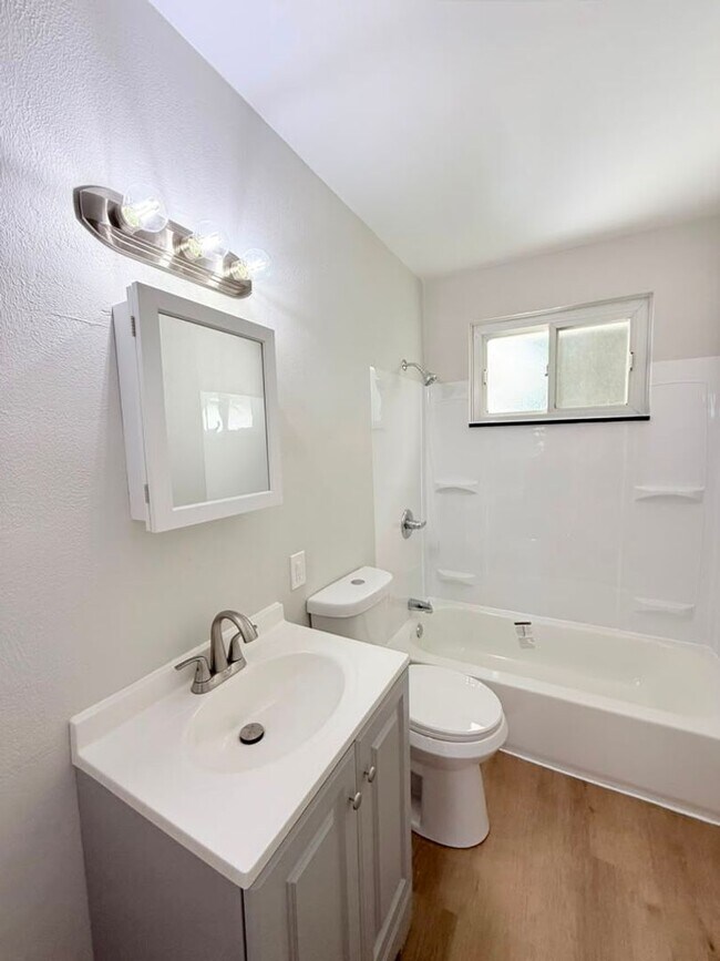 Building Photo - Newly remodeled 3-bedroom, 1.5-bath home featuring granite countertops, central A/C, and a partia...
