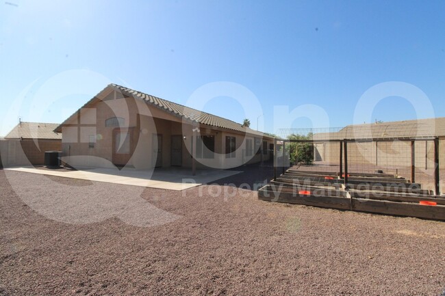 Building Photo - 9953 E Onza Ave