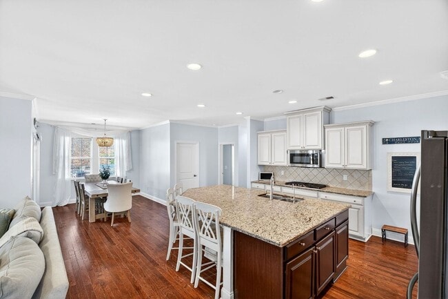 Building Photo - Experience Elevated Living on Cutleaf Drive!