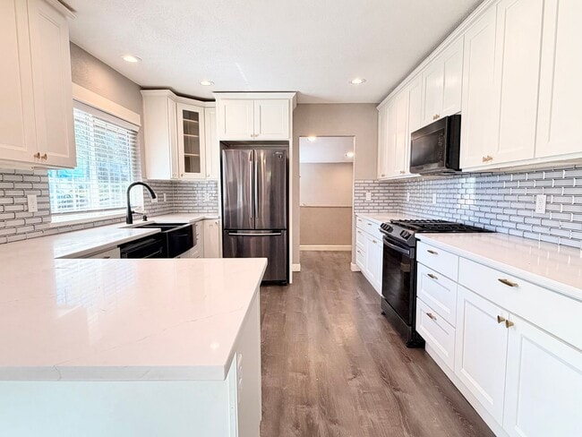 Building Photo - Lovingly Updated Home with Separate Garage, Outdoor Cat Enclosure, Finished Basement, Large Yard,...