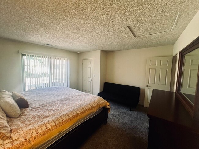 Building Photo - Affordable Comfort in 55+ Guard-Gated Comm...
