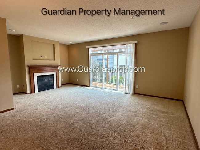 Building Photo - Pet Free Champlin Town Home, 3.5 Baths, 2 Car Garage, Dishwasher, Balcony, Available end of April