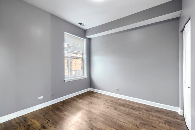 Building Photo - 7724 S Cornell Ave
