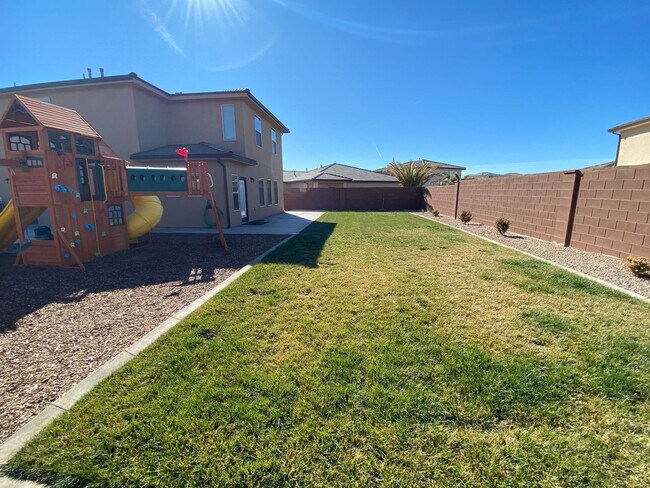 Building Photo - Gorgeous Home with HUGE backyard and play-set.