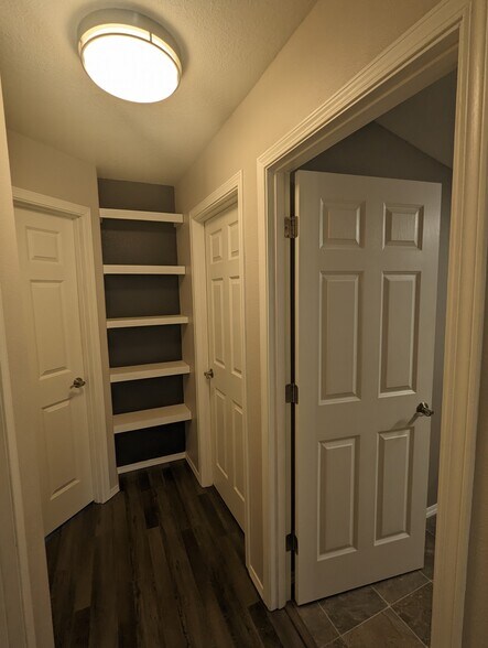 end of hallway shelving - 9413 NE 227th Ave