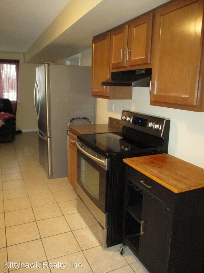 Building Photo - 4 br, 2.5 bath House - 4900 Arrowview Drive