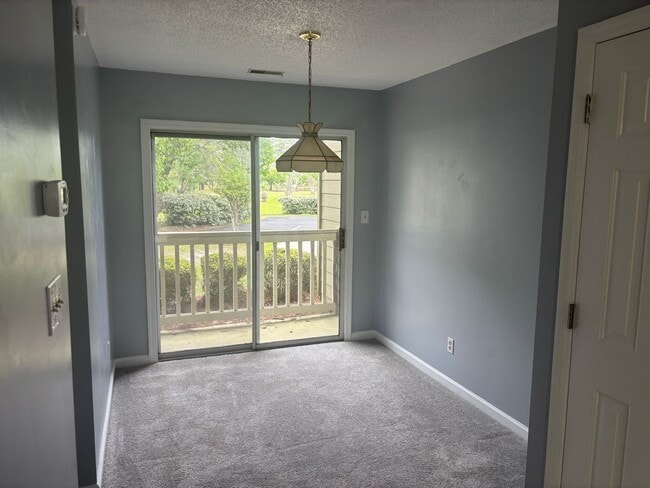 Building Photo - 2 BEDROOM 2 BATH CONDO ON BOTTOM FLOOR AT MYRTLE GREENS