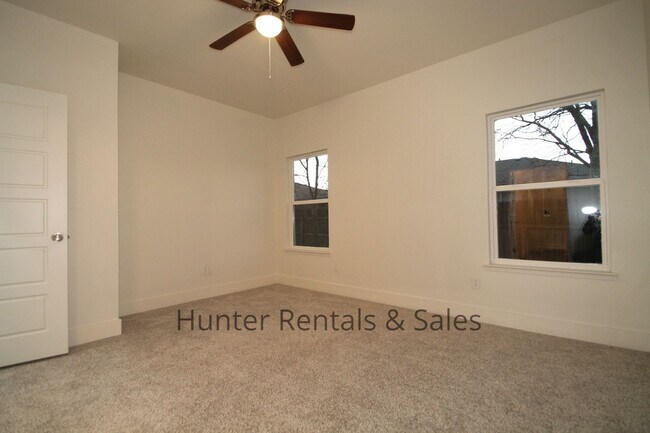 Building Photo - Upscale Four-Bedroom Townhome!