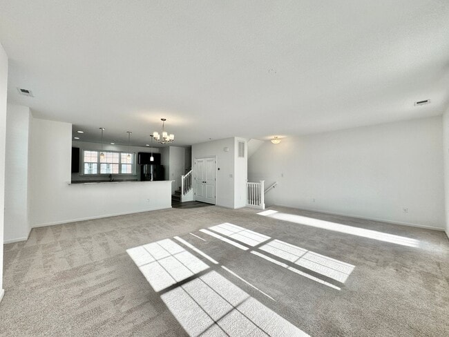Building Photo - 3 Bedroom Townhome in Spence Crossing! Water/Sewer/Trash/Landscaping INCLUDED! - Attached Garage ...