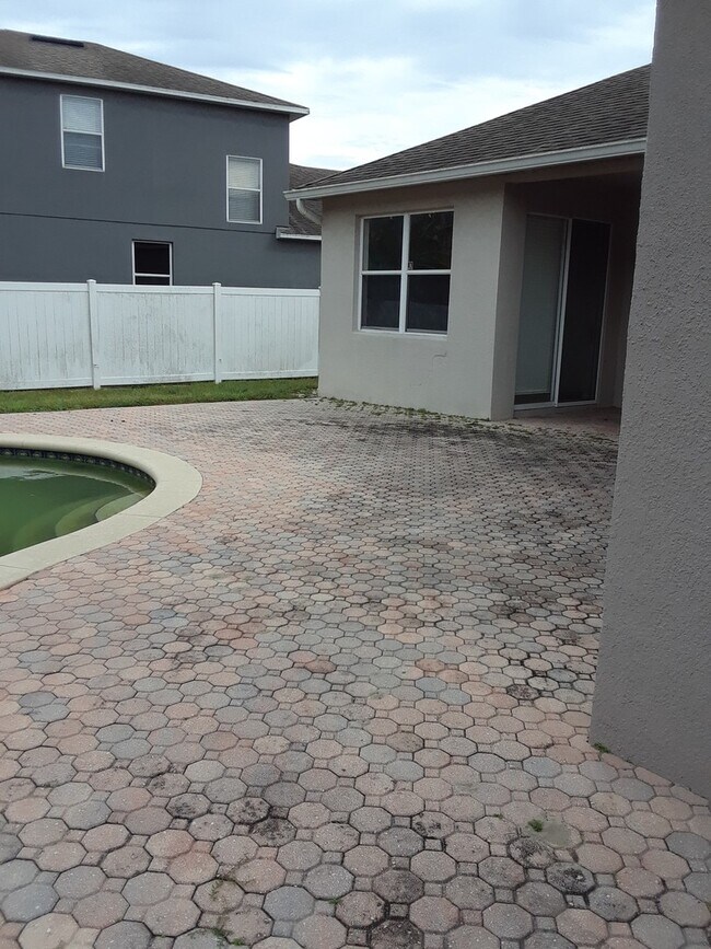 Building Photo - Spacious 4-Bedroom Pool Home with 3-Car Ga...