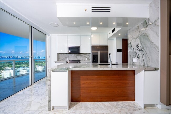 Building Photo - 6365 Collins Ave
