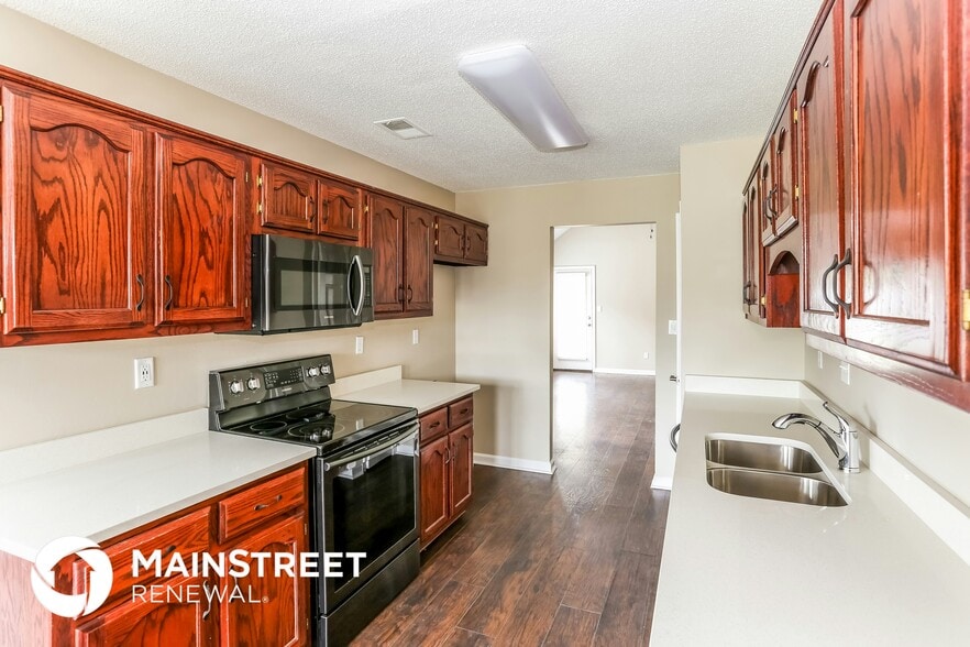 Building Photo - 7644 Tally Ho Dr E