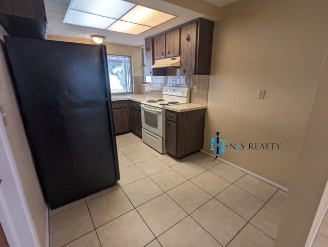 Building Photo - Section 8 available: 2/2 over 1048sf with ...