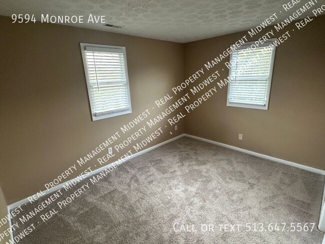 Building Photo - 9594 Monroe Ave