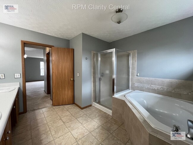 Building Photo - Spacious 4-Bedroom Home with Fenced Backyard, Deck, and 2-Car Garage