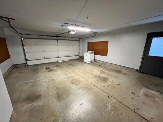 Building Photo - Step into this inviting, sunlit home where space and comfort blend seamlessly