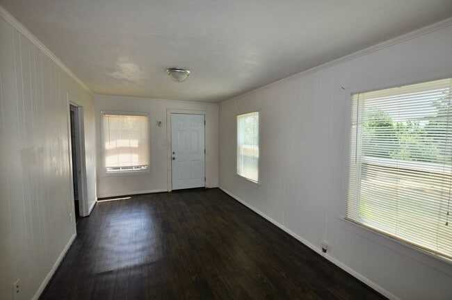 Building Photo - FOR LEASE - 1 BR - 1 BA Frame Home on Larg...