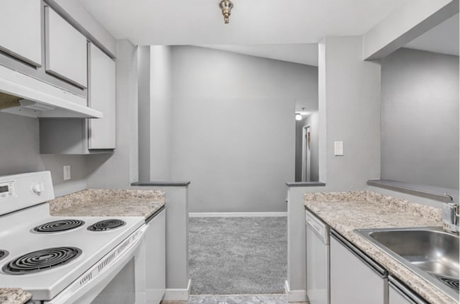 Building Photo - 2BR Condo w/ Vaulted Ceilings, W/D, Parking & Amenities