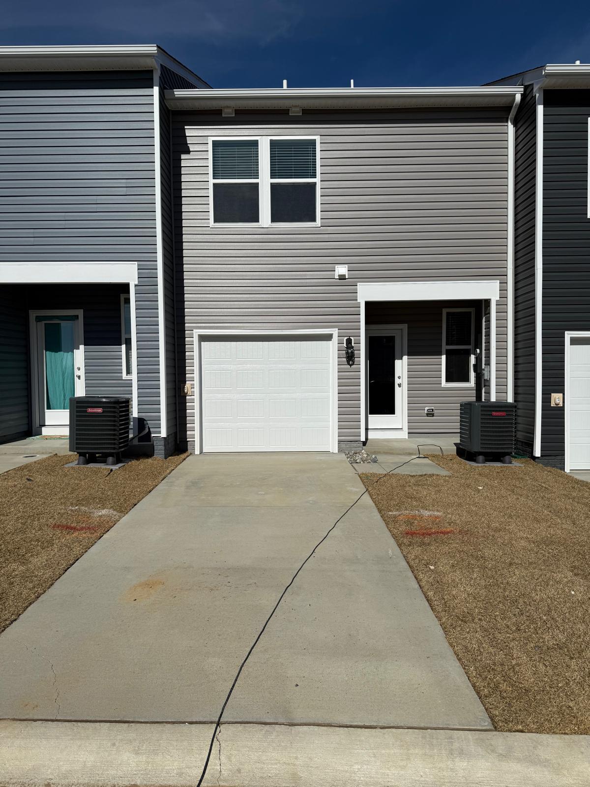 rear entrance/driveway - 157 Tigney Dr