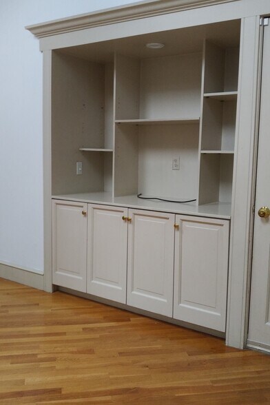 Den with TV and storage console - 40 Brookway Rd