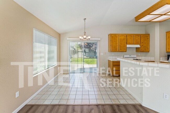 Building Photo - 8560 Harvest House Way