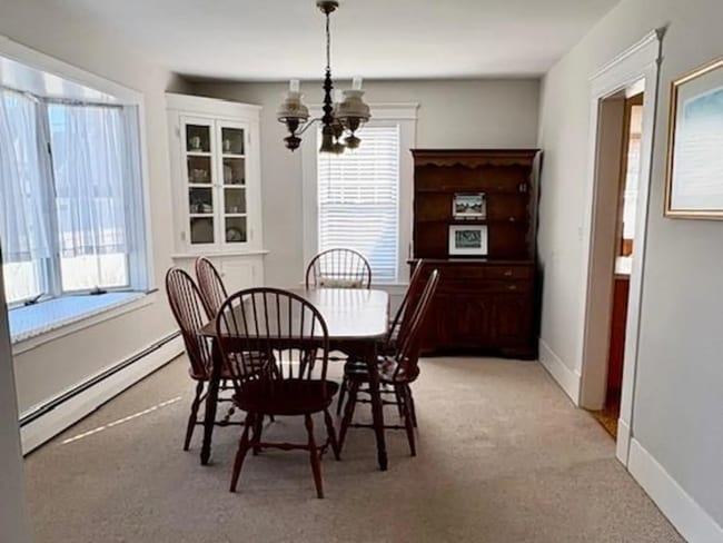 Building Photo - Charming three-bedroom, 1.5 bath fully furnished