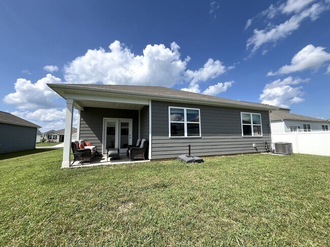 Building Photo - 4-Bedroom w/ Open Layout & Community Perks