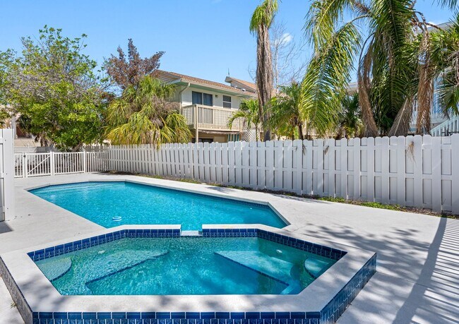Building Photo - Steps to One of the Finest Beaches – Spaci...