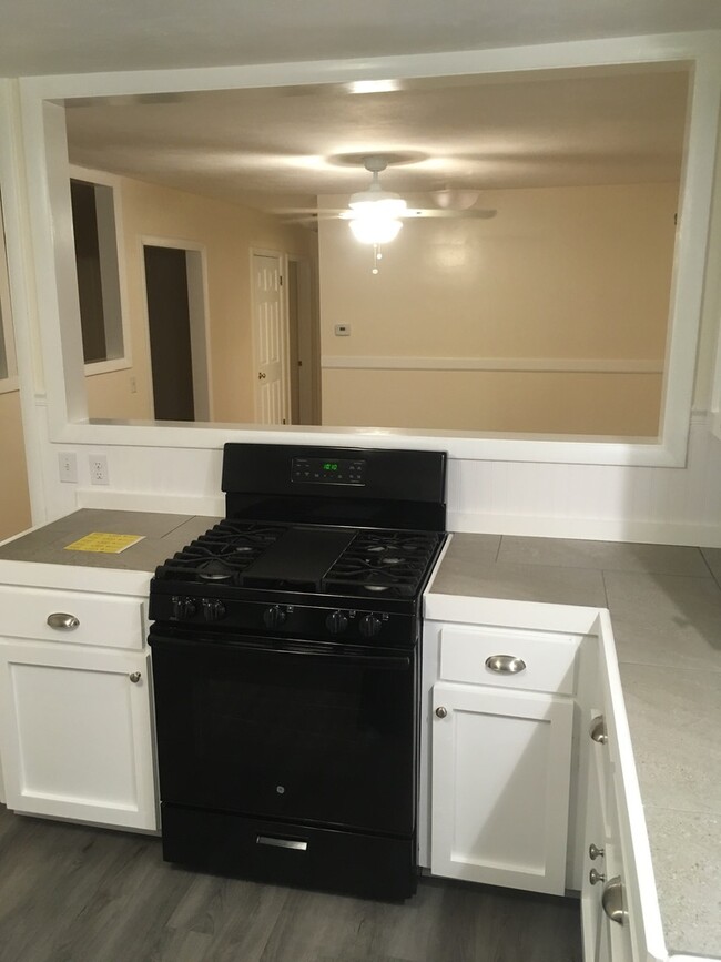 Kitchen looking toward dining room - 64 Main St
