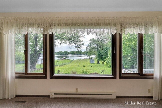 Building Photo - "Charming 3-Bedroom Lakehouse retreat with Spacious 2128 Sq Ft Layout in Hastings, MI!"