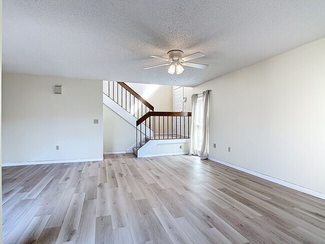 Building Photo - Spanish-Style 3 Bedroom, 2.5 Bath Mediterranean Rooftop Townhouse – Basic Cable & Wi-Fi Included!