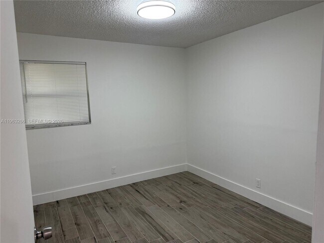 Building Photo - 2700 Coral Springs Dr