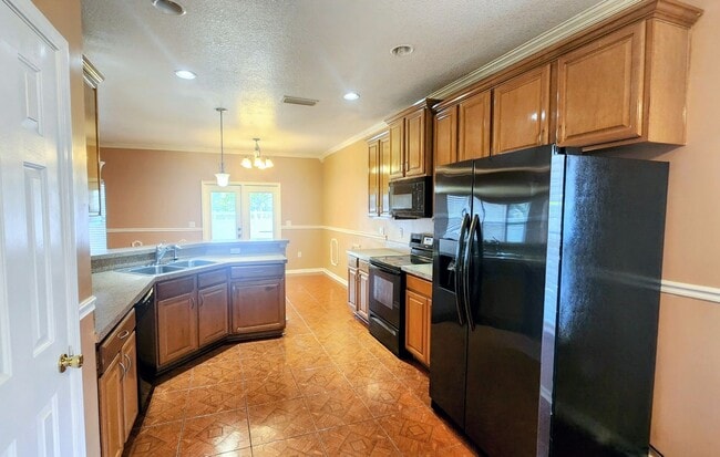 Building Photo - Spacious 4BR w/ Fenced Yard + Covered Lanai + 2 Car Garage  in Orange Park!