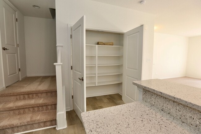 Building Photo - 3 Bedroom Townhome in Spence Crossing! Water/Sewer/Trash/Landscaping INCLUDED! - Attached Garage ...