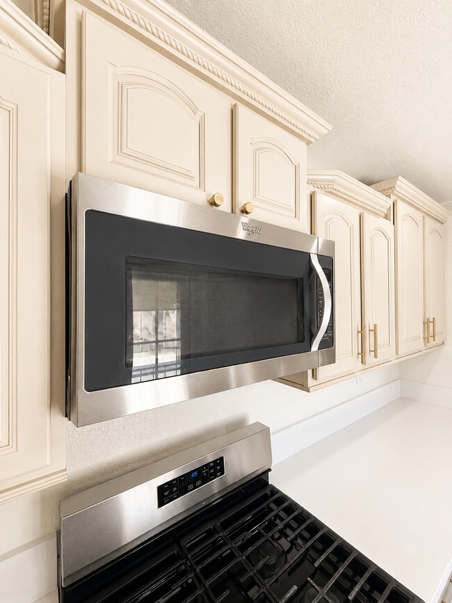 Building Photo - EV Charging Station.  Solar savings. Beautifully Updated Home with Designer Flooring, Upgraded Ki...
