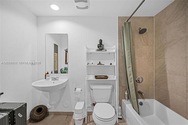 Building Photo - 7728 Collins Ave