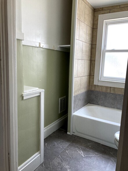 New tub and flooring - 3017 Portman Ave